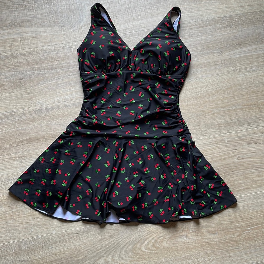 Shekini small cherry swimsuit with attached skirt over boy shorts